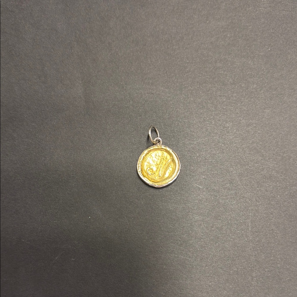 Waxing Poetic Round Insignia letter “N”